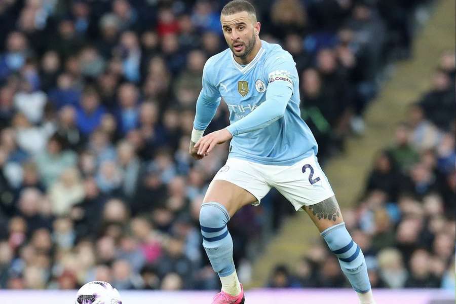 Altercation: Man City captain Walker confronts ref Oliver during halftime of Arsenal draw